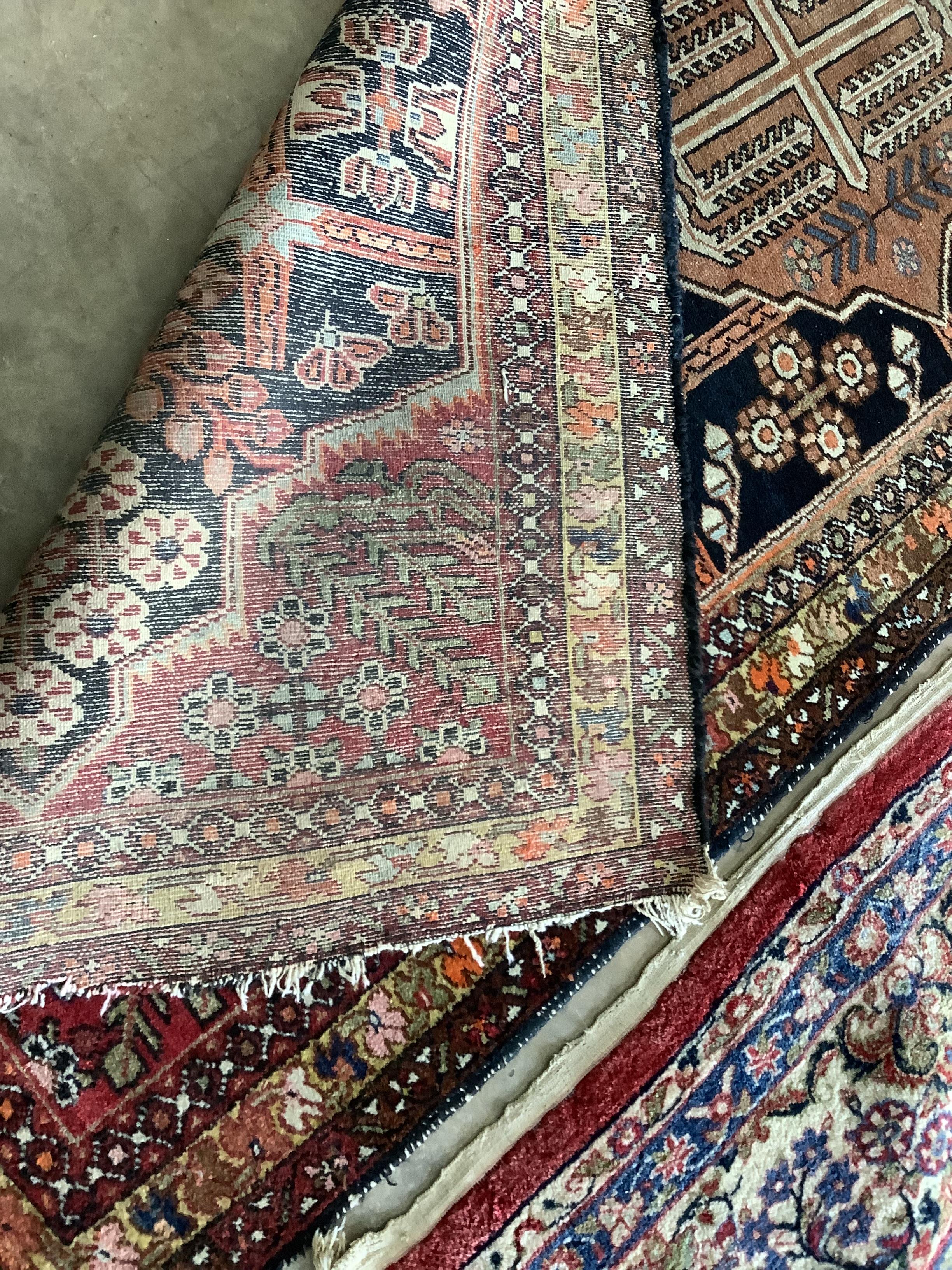 An antique Turkish blue ground geometric runner, 290 x 106cm
